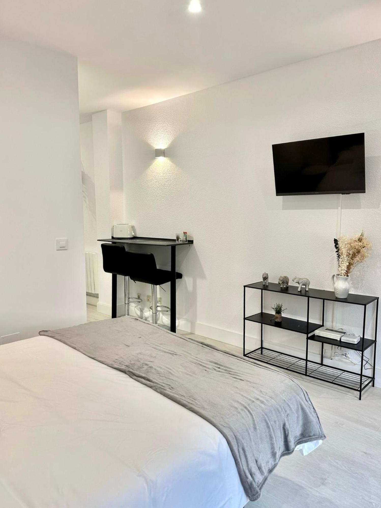 Apartamentos Val De Комільяс Екстер'єр фото